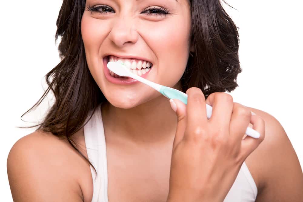 як чистити зуби