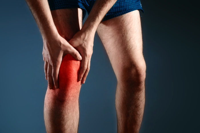 причиною болю в коліні
